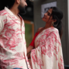 Couple’s Coordinated Ethnic Ensemble – White & Red Printed Saree with Matching Shirt and Jeans