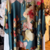 Women’s Teal Floral Tie-Neck Blouse with White Pants – Vibrant Boutique-Style Casualwear
