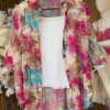 Women’s Multicolor Floral Overshirt with White Tee and Denim Shorts – Casual Layered Streetwear Ensemble