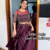 Women’s Red Embroidered Skirt Top Set with Traditional Earrings – Ethnic Doorway Portrait Ensemble
