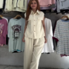 570-2.png Elegant Beige Sleeveless Belted Top & Wide-Leg Pant Co-ord Set