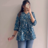 Women’s Black Short Kurti with White Threadwork & Light Blue Jeans – Casual Ethnic Streetwear Edit