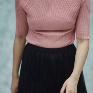 1164-1.png Women’s Pink Ribbed Half-Sleeve Top with Black Pleated Mini Skirt – Chic Contrast Casualwear Ensemble