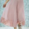 1164-5.png Women’s Pink Ribbed Half-Sleeve Top with Black Pleated Mini Skirt – Chic Contrast Casualwear Ensemble