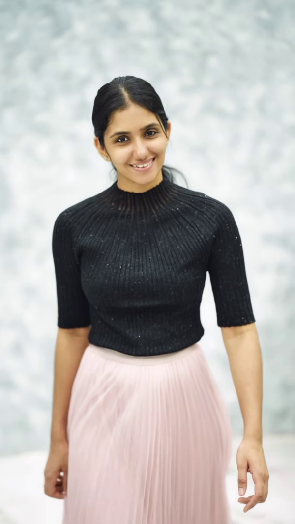 1164-6.png Women’s Pink Ribbed Half-Sleeve Top with Black Pleated Mini Skirt – Chic Contrast Casualwear Ensemble