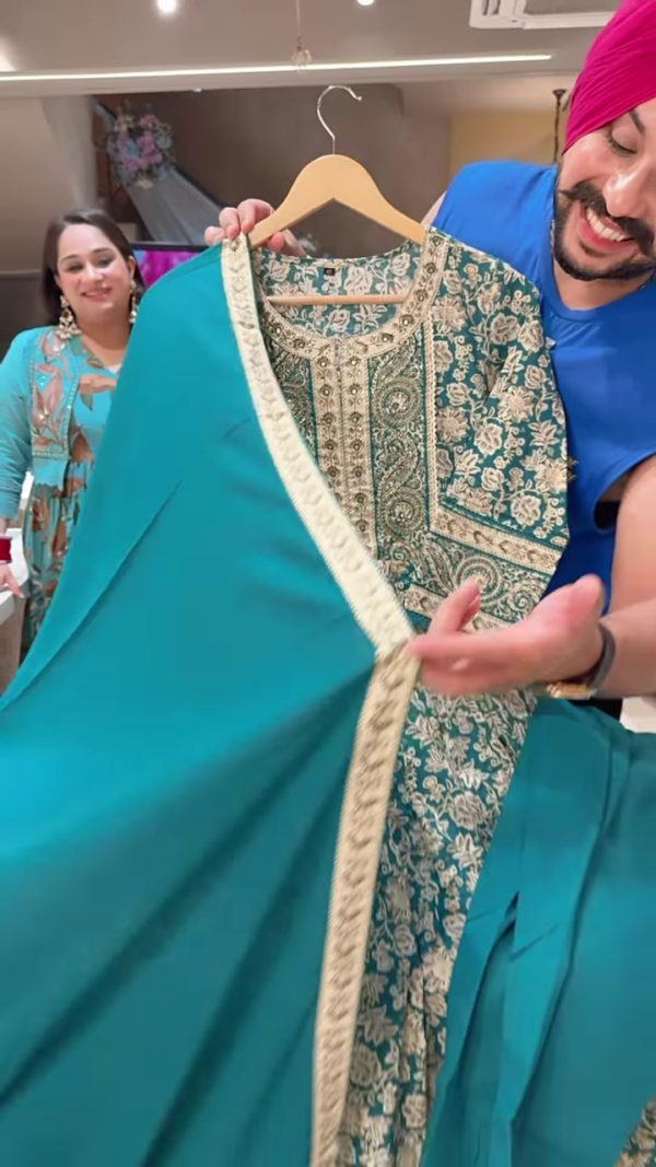 1199-1.png Women’s Teal Embroidered Long Kurti with Beige Floral & Paisley Motifs – Ethnicwear Portrait Piece for Seasonal Styling