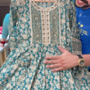 1199-3.png Women’s Teal Embroidered Long Kurti with Beige Floral & Paisley Motifs – Ethnicwear Portrait Piece for Seasonal Styling