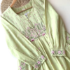 1200-1.png Women’s Light Green Floral Embroidered Long Kurti – Pastel Ethnicwear with White-Pink Motifs & Sleeve Detailing