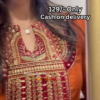 Women’s Orange Embroidered Kurti with Gold & Red Threadwork – Festive Ethnicwear Styled with Black Clutch Accessory