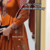 Women’s Orange Embroidered Kurti with Gold & Red Threadwork – Festive Ethnicwear Styled with Black Clutch Accessory