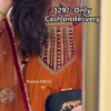 Women’s Orange Embroidered Kurti with Gold & Red Threadwork – Festive Ethnicwear Styled with Black Clutch Accessory