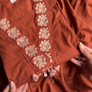 1203-6.png Women’s Reddish-Brown Ethnic Kurti with Floral Embroidery, Tassels & Shell Accents – Handcrafted Neckline Detailing for Festive Styling