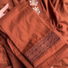 Women’s Reddish-Brown Ethnic Kurti with Floral Embroidery, Tassels & Shell Accents – Handcrafted Neckline Detailing for Festive Styling