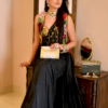 Women’s Black Saree with Gold Embellishments & Pleated Draping – Elegant Ethnicwear Styled with Traditional Bracelet