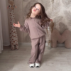 1207-3.png Kids’ Light Brown Co-Ord Set with Long Sleeves & White Sneakers – Neutral-Tone Outfit Styled with Giraffe Plush & Personalized Decor