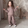1207-4.png Kids’ Light Brown Co-Ord Set with Long Sleeves & White Sneakers – Neutral-Tone Outfit Styled with Giraffe Plush & Personalized Decor