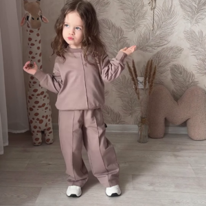 1207-4.png Kids’ Light Brown Co-Ord Set with Long Sleeves & White Sneakers – Neutral-Tone Outfit Styled with Giraffe Plush & Personalized Decor