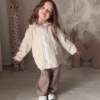1207-7.png Kids’ Light Brown Co-Ord Set with Long Sleeves & White Sneakers – Neutral-Tone Outfit Styled with Giraffe Plush & Personalized Decor