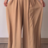 Women’s Beige Wide-Leg Pleated Pants with Drawstring Waist – Flowing Casualwear Styled with White Sneakers