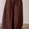 Women’s Beige Wide-Leg Pleated Pants with Drawstring Waist – Flowing Casualwear Styled with White Sneakers