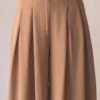 Women’s Beige Wide-Leg Pleated Pants with Drawstring Waist – Flowing Casualwear Styled with White Sneakers