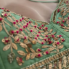 177-2.png Regal Pink & Green Hand-Embroidered Lehenga Set