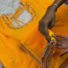 2657-1.png Sunlight Yellow Designer Gown with Ornate Pearl Borders