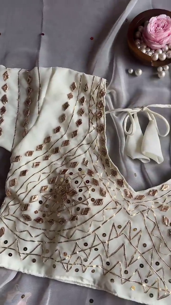 2700-2.png Luminous Cream Saree with Ornate Geometric Artistry
