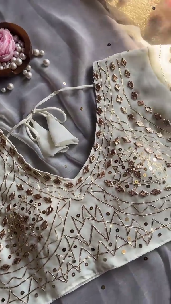 2700-3.png Luminous Cream Saree with Ornate Geometric Artistry