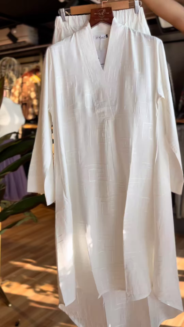 Ivory Ease: High-Low Layered Palazzo Pants