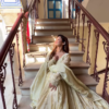 7002-1.png Ivory Luminescence: Scalloped Zari Anarkali Gown