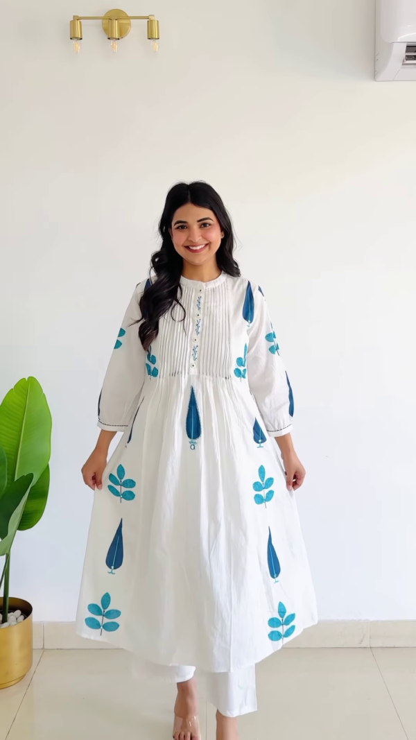 Meadow Serenade: Pleated Floral Cotton A-Line Suit Set