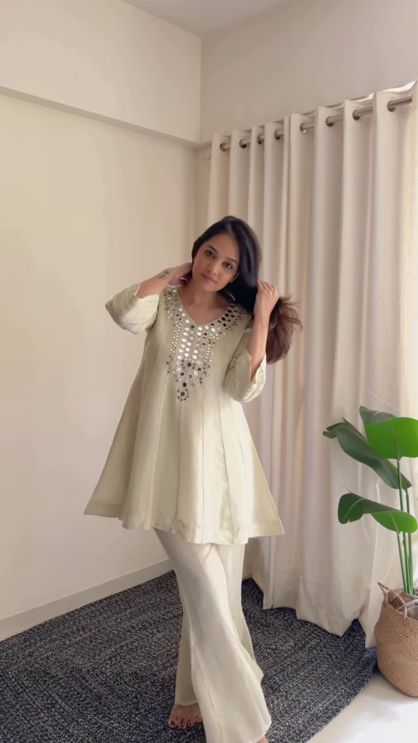 Ivory Luminescence: Mirror-Work Flared Tunic & Sharara Set